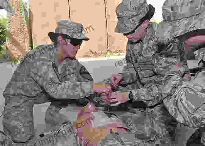 A Combat Medic Treats A Wounded Soldier In Iraq. Rolling Through Afghanistan: Life As A Combat Medic Enduring PTSD