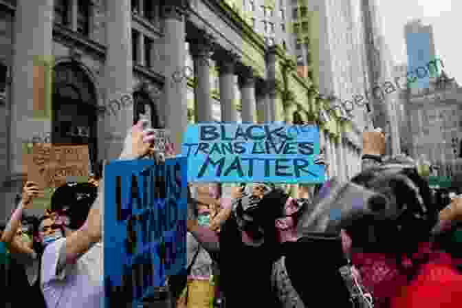 A Crowd Of Protesters Holding Signs With Slogans Such As The Black Avenger In Atlantic Culture