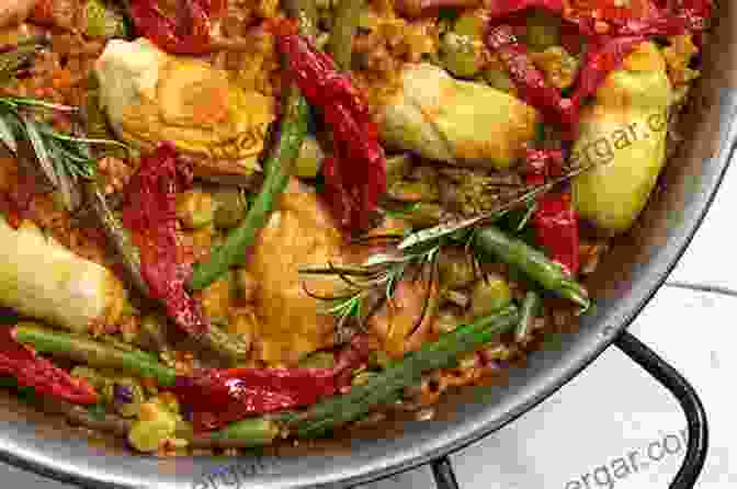 A Traditional Valencian Paella With Chicken, Rabbit, Green Beans, And Garrofón Beans Great Spanish Paella Recipes For You: Traditional Spanish Paella Recipe: Spanish Paella Yummy Recipes