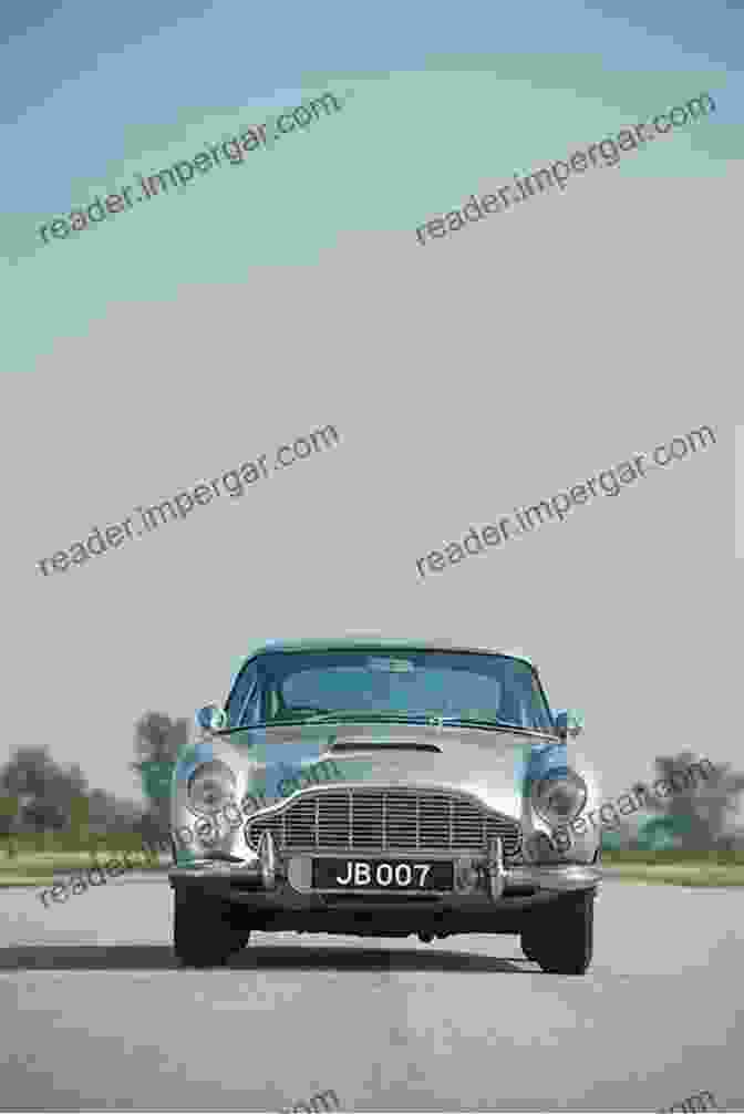 An Aston Martin DB5 Speeding Along A Winding Road Best Of British Classic Cars