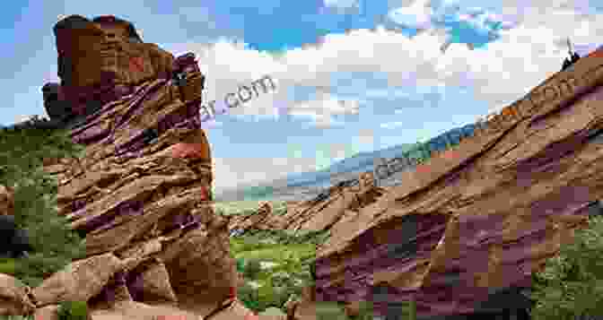 Hiker Walking On A Trail Surrounded By Red Rock Formations A Visitors Guide To Valley Of Fire State Park